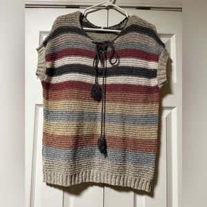 Lightweight, short sleeve sweater.